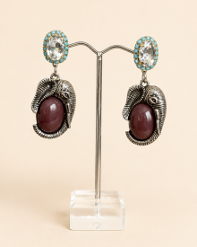 Orecchini pendenti con elefante e cabochon ovale